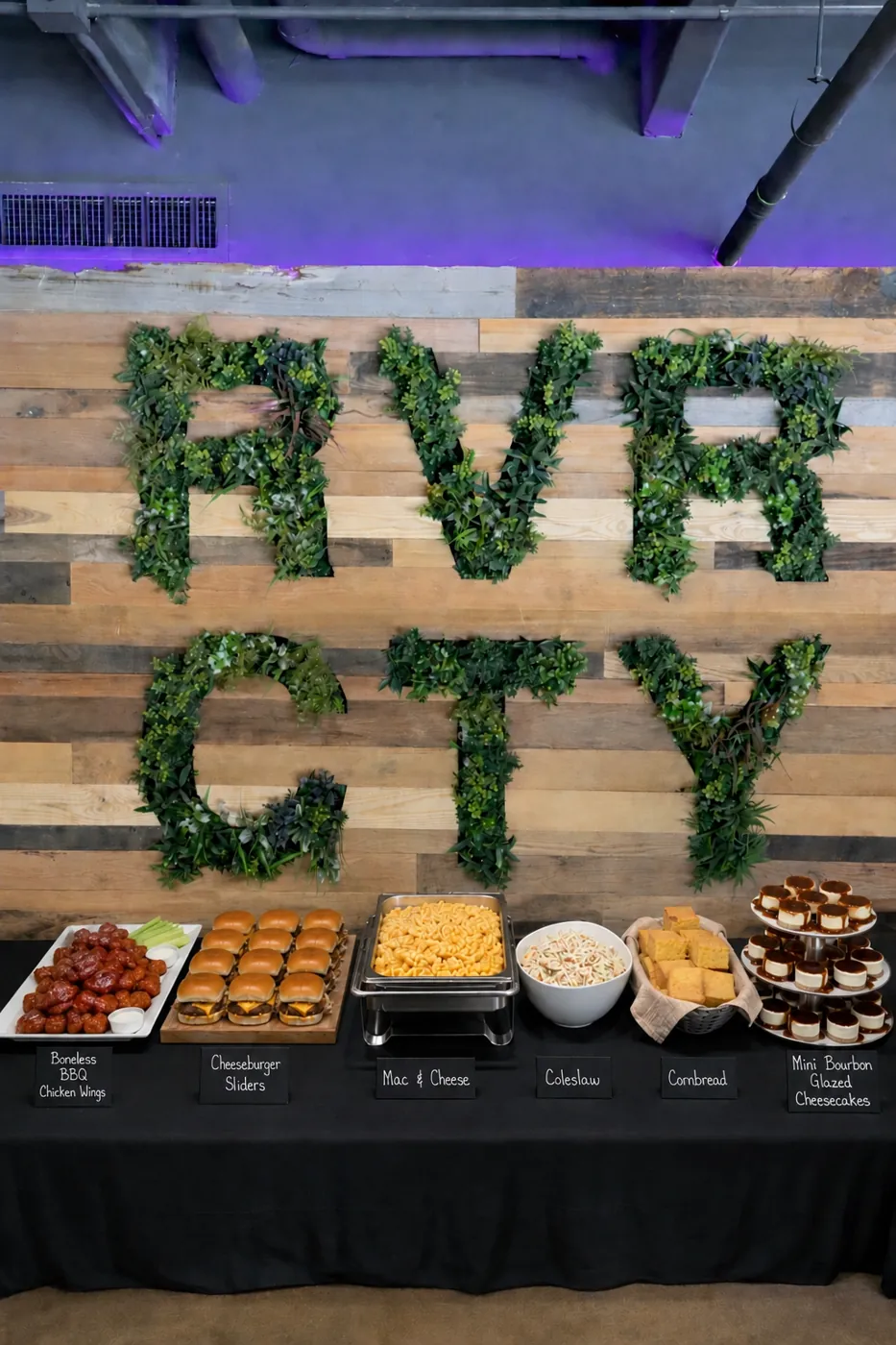 Event catering buffet under the River City wall at Pour Taproom Jacksonville