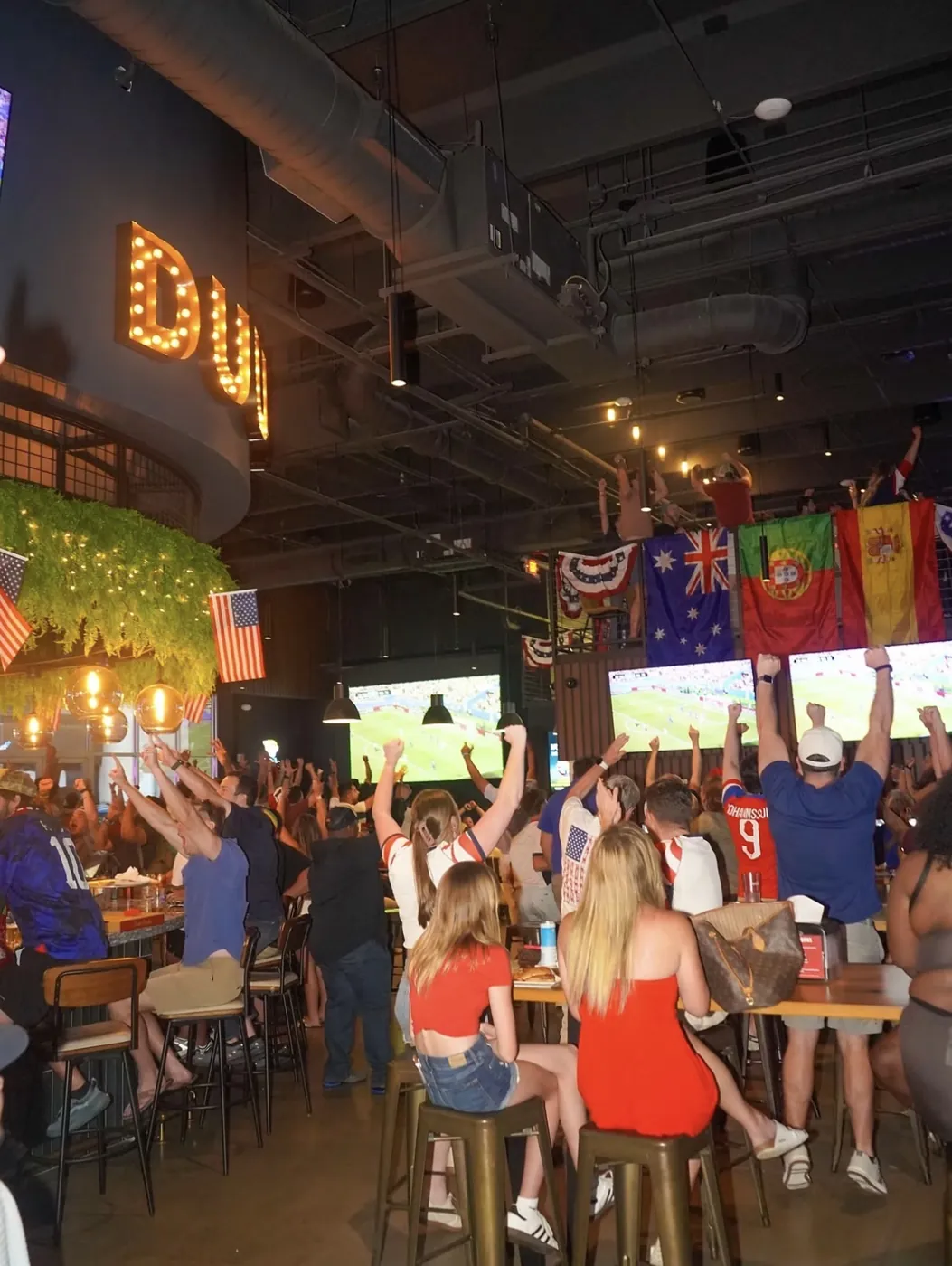 Game day crowd cheering at Pour Taproom Jacksonville