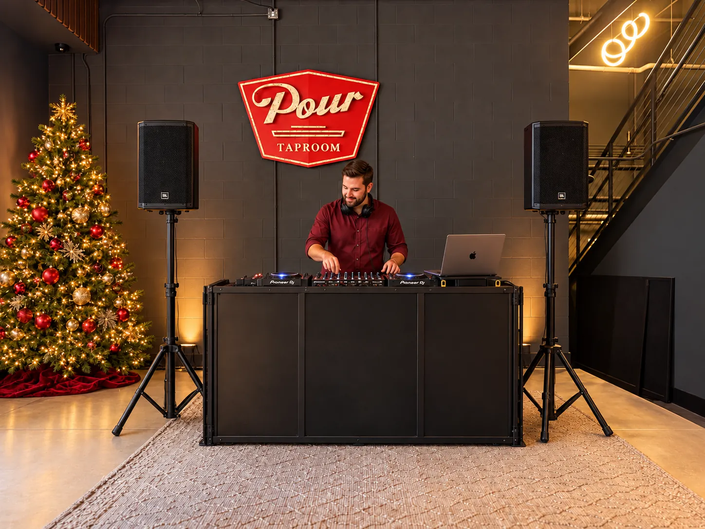 DJ on stage at a holiday party at Pour Taproom Jacksonville